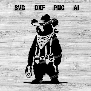 Op de afbeelding: Een zwart silhouet van een beer die een cowboyhoed, bandana en pistoolriem met lasso draagt. De beer staat op een houten achtergrond.