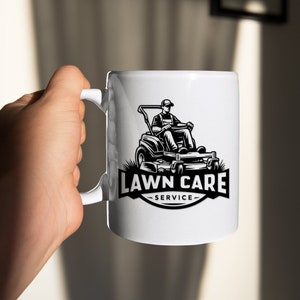 May include: White ceramic mug featuring a black and white illustration of a person operating a lawnmower. The text "LAWN CARE -SERVICE- " is printed below the illustration.
