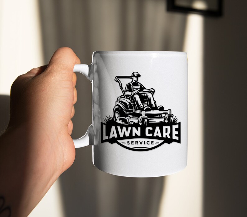 May include: White ceramic mug featuring a black and white illustration of a person operating a lawnmower. The text "LAWN CARE -SERVICE- " is printed below the illustration.