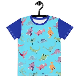Colorful Dinosaur Kids T-Shirt – Cute All-Over Print Tee for Toddlers & Children – Prehistoric Cartoon Dino Shirt for Boys or Girls