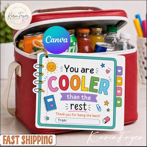 May include: A red cooler bag with a white handle, open to reveal various beverages. A tag reads "You are COOLER than the rest" with a space to write a name. The cooler contains cans and bottles of drinks.