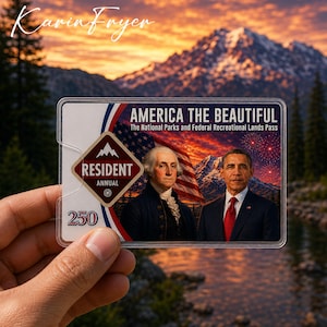 May include: A clear plastic America the Beautiful National Parks Pass. The pass features images of George Washington and Barack Obama, with the text "AMERICA THE BEAUTIFUL" and "RESIDENT ANNUAL". The background shows a mountain range and sunset.