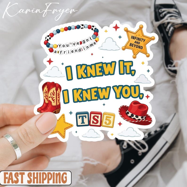 May include: A die-cut sticker featuring the text I KNEW IT, I KNEW YOU, with illustrations of a beaded bracelet reading You've got a friend in me, a gold sheriff badge saying INFINITY AND BEYOND, red cowboy boots, a red hat, and TS5 blocks.