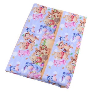 May include: Blue fabric with a repeating pattern of Winnie the Pooh and friends. The characters are in various poses and include Tigger, Piglet, Eeyore, and Rabbit. The fabric is perfect for quilting, crafts, and other projects.