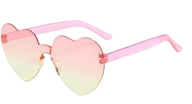 May include: Rimless heart-shaped sunglasses featuring a gradient lens transition from a soft pink at the top to a pale yellow at the bottom. The frames include translucent pink plastic temples attached to the lenses with small metal hinges.