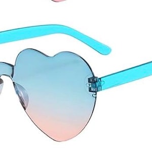 May include: Heart-shaped rimless sunglasses featuring a gradient lens that transitions from a light blue at the top to a soft pink at the bottom. The temples are made of a translucent bright blue plastic material, connecting to the lenses.