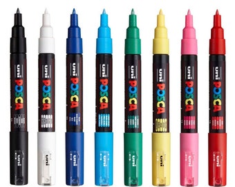 May include: A set of ten Uni Posca paint markers in various colors, including black, white, blue, light blue, green, yellow, pink, and red. The markers are all the same size and have a black cap with white lettering.