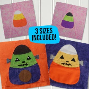 May include: Three different Halloween-themed candy corn quilt blocks. The blocks are made of fabric in orange, green, purple, yellow, white, and black. The text "3 SIZES INCLUDED!" is on a blue background.