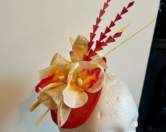 Red and yellow fascinator