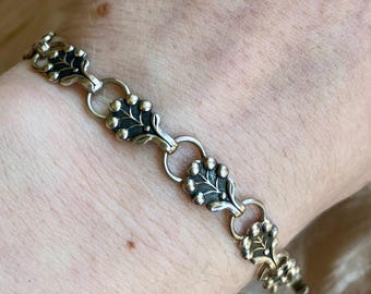 ミッドセンチュリーのヴィンテージシルバーブレスレット、花と葉のデザイン