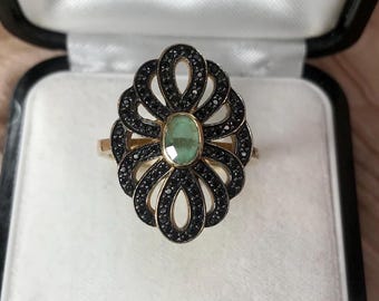 Size 8.75 sparkly cocktail ring with marcasites and green center stone