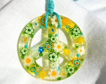 Colorful peace sign, peace sign made of millefiori beads in epoxy resin