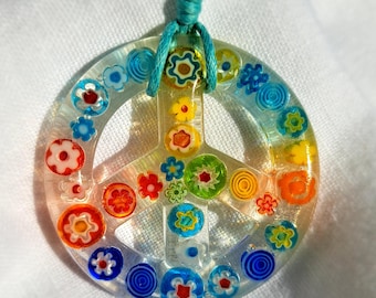 Colorful peace sign, peace sign made of millefiori beads in epoxy resin
