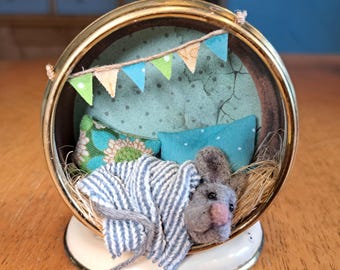 Little mouse in an old alarm clock, miniature, unique, diorama