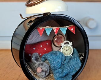 Little mouse in an old alarm clock, miniature, unique, diorama