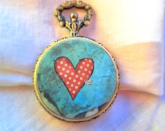 Unique locket with a love message made from a pocket watch case