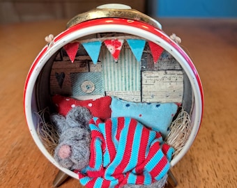 Little mouse in an old alarm clock, miniature, unique, diorama