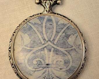 Unique locket with a love message made from a pocket watch case