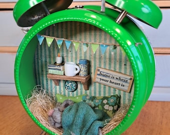 Little mouse in an old alarm clock, miniature, unique, diorama