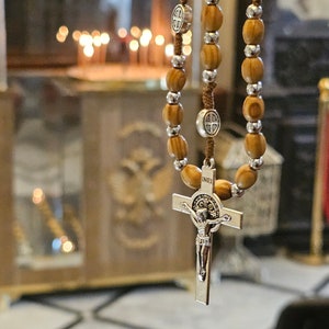Rosary 10mm oval Wood and metal beads comes with a leather bag Can be worn Made in the Holy land