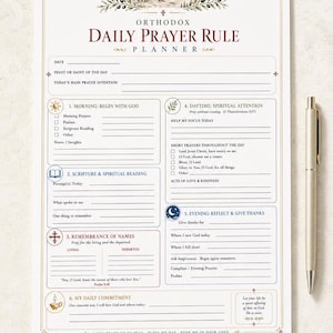 Puede incluir: Una hoja de planificador Orthodox Daily Prayer Rule con un encabezado en dorado y rojo que presenta una ilustración de una iglesia. El diseño incluye seis secciones para el seguimiento espiritual diario, intenciones de oración y reflexiones, junto a un bolígrafo.