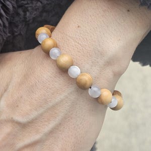 Elastic bracelet Tau cross olivewood and glass beads Hand made in Jerusalem the Holy land