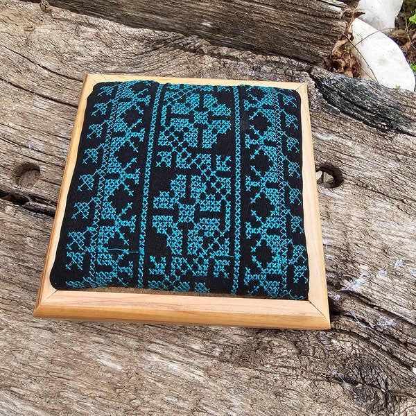 A jewelry box made of olive wood.  Flower pattern embroidery.  Handmade from Bethlehem, the Holy Land