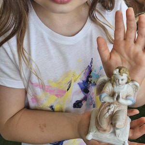 Vintage Kneeling Porcelain Angel Figurine