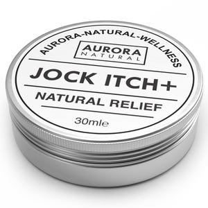 May include: A silver tin container with a white label that reads "Aurora Natural Wellness Jock Itch+ Natural Relief 30mle".