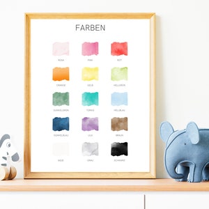 May include: A framed poster with the word "FARBEN" at the top and a color chart with 16 different colors. The colors are arranged in four rows of four, with each color labeled in German. The colors are: rosa, pink, rot, orange, gelb, hellgr&uuml;n, dunkelgr&uuml;n, t&uuml;rkis, hellblau, dunkelblau, lila, braun, wei&szlig;, grau, and schwarz.