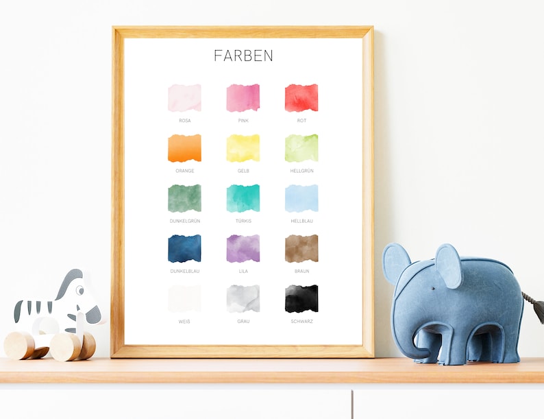 May include: A framed poster with the word "FARBEN" at the top and a color chart with 16 different colors. The colors are arranged in four rows of four, with each color labeled in German. The colors are: rosa, pink, rot, orange, gelb, hellgr&uuml;n, dunkelgr&uuml;n, t&uuml;rkis, hellblau, dunkelblau, lila, braun, wei&szlig;, grau, and schwarz.