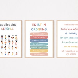 May include: Three colorful posters with text in German. The left poster has the title "Das alles sind GEF&Uuml;HLE" and shows a grid of 36 cartoon children expressing different emotions. The middle poster has the title "ES IST IN ORDNUNG" and lists phrases like "Fragen zu stellen" and "Hilfe zu brauchen". The right poster has the title "Ich kann lernen" and lists phrases like "Ich bin stolz auf mich" and "Ich respektiere mich und andere".