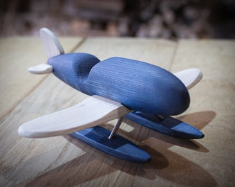 Handmade wooden seaplane, toy. Gift for birthday child.