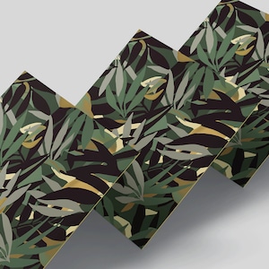May include: Three cards featuring a repeating pattern of stylised green, gold, and black leaves. The cards are stacked on top of each other, with the top card slightly offset to the right.