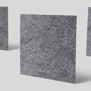 Puede incluir: Tres paneles cuadrados grises con una superficie moteada y texturizada. Los paneles están dispuestos en diferentes ángulos, mostrando la textura rugosa, similar a la piedra. Los bordes revelan un núcleo de color claro, lo que sugiere una construcción en capas. Ideal para la decoración del hogar.