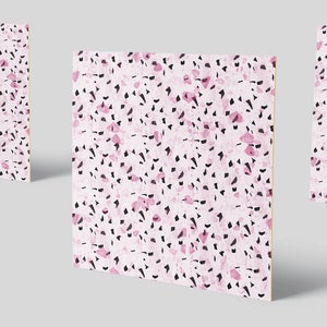 May include: Pink and black abstract pattern on a square canvas. The pattern is made up of small, irregular shapes.
