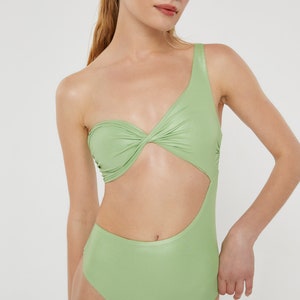 One shoulder one piece bathing suit with front twist cut outs Mint green