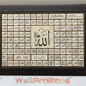 May include: A framed artwork with a mosaic of small tiles featuring the Arabic word "Allah" in the center. The tiles are arranged in a grid pattern and contain various Arabic script.