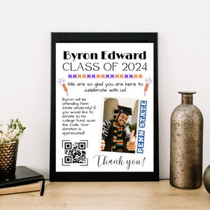 May include: A black framed sign with a white background and the text "Byron Edward CLASS OF 2024" in black. The sign also includes a photo of a person wearing a graduation cap and gown, a QR code, and the text "We are so glad you are here to celebrate with us!" and "Thank you!"