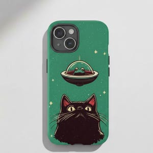 May include: A set of three ceramic mugs with a speckled, matte finish. The mugs are in shades of cream, light gray, and dark gray. Each mug has a simple, minimalist design, perfect for coffee or tea.