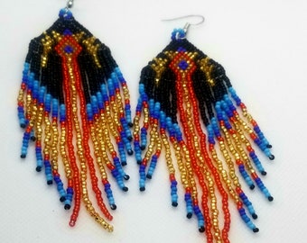 Hand beaded tassel earrings in black,  gold,  blue and orange