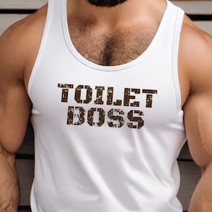 May include: White tank top with the text "TOILET BOSS" printed in brown on the front. The model is wearing sunglasses and has a beard.