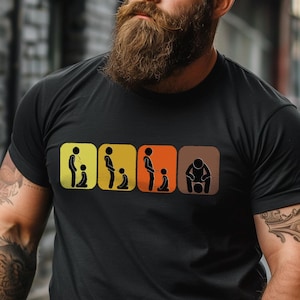 May include: A man with a long beard is wearing a black t-shirt with a graphic of five stick figures in a row. Each stick figure is in a different pose, and they are all wearing the same clothes. The graphic is on a yellow background.