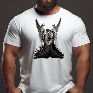 May include: White t-shirt with a black and white graphic print of two angels embracing.