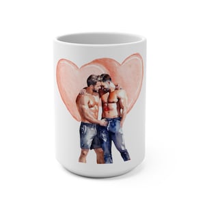 May include: White ceramic mug with a watercolor illustration of two men embracing, surrounded by a pink heart.