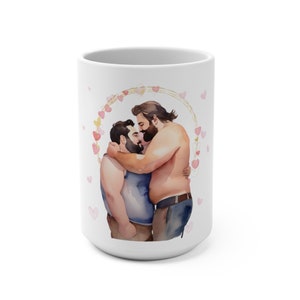 May include: White ceramic mug with a watercolor illustration of two men kissing. The men are embracing and surrounded by a wreath of pink hearts.