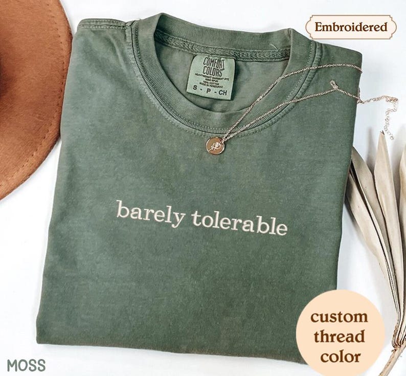 a green t - shirt with the words barley tolerable on it