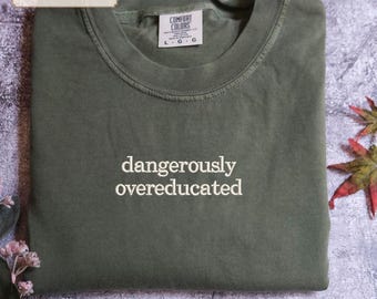 Comfort Colors® Dangerously Overeducated Shirt, Doctorate Shirt, Doctors Degree Shirt, PhD Graduation Shirt, Funny PhD Gifts, Doctorate Gift