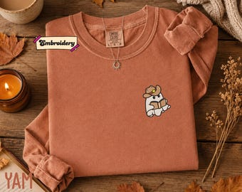 Embroidered Cowboy Ghost Reading a book Sweatshirt, Comfort Colors Autumn Sweatshirt, Halloween Hoodie, Bookish Sweater, Gift for reader