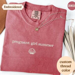 a t - shirt with the words pregnant girl summer printed on it